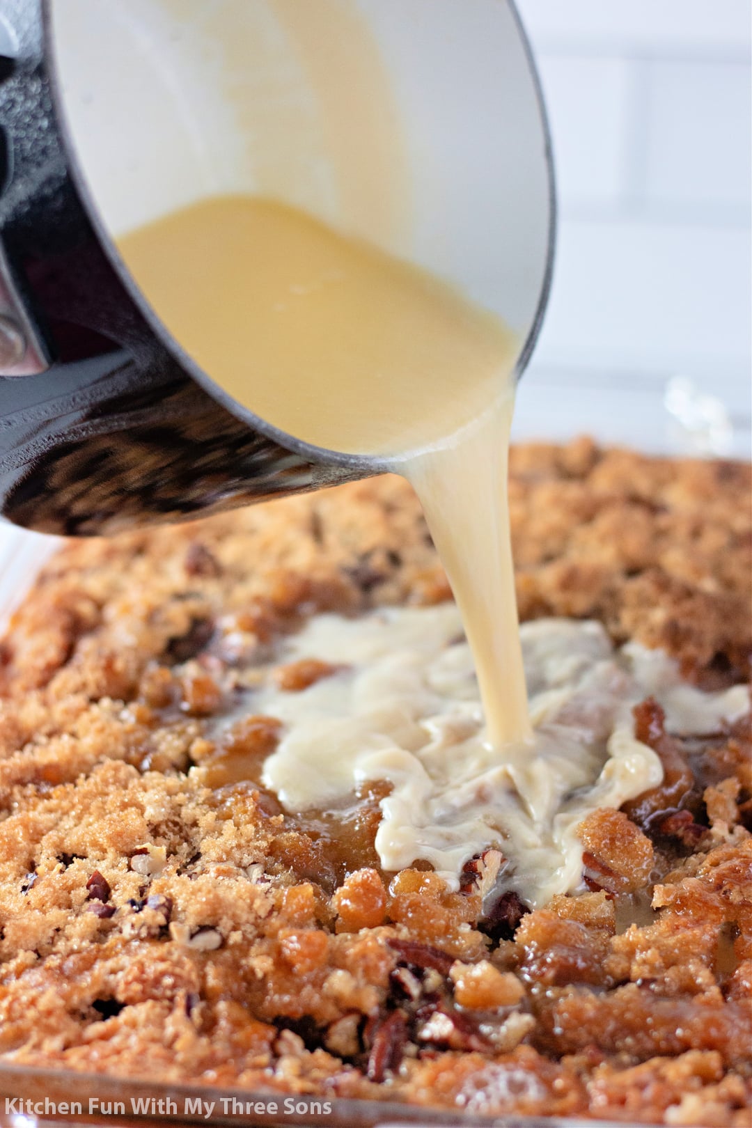 pouring hot glaze over Granny Cake.