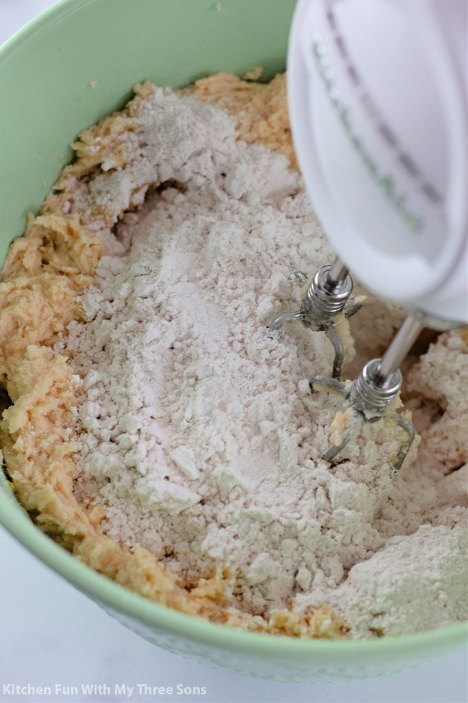 mixing the dry ingredients into the wet.