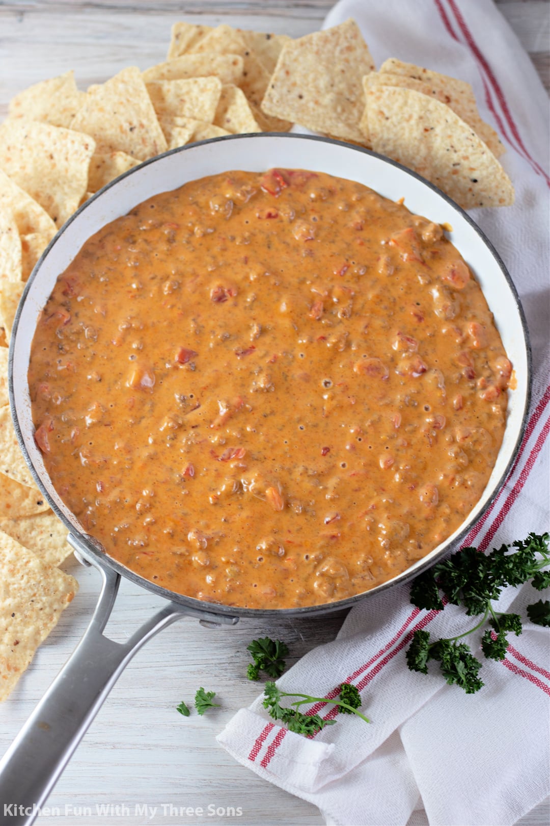 freshly made Rotel Dip in a skillet with tortilla chips.