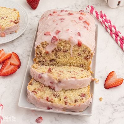 Strawberry Bread is a delicious homemade bread recipe with real strawberries baked inside. It's moist and soft and topped with a strawberry glaze.