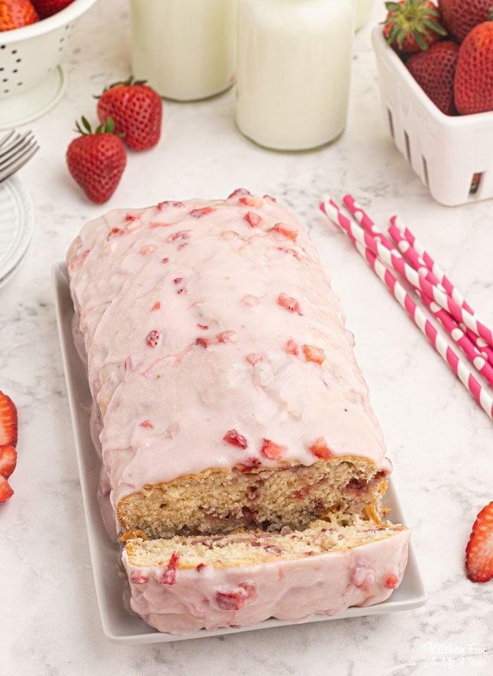 Strawberry Bread is a delicious homemade bread recipe with real strawberries baked inside. It's moist and soft and topped with a strawberry glaze. 