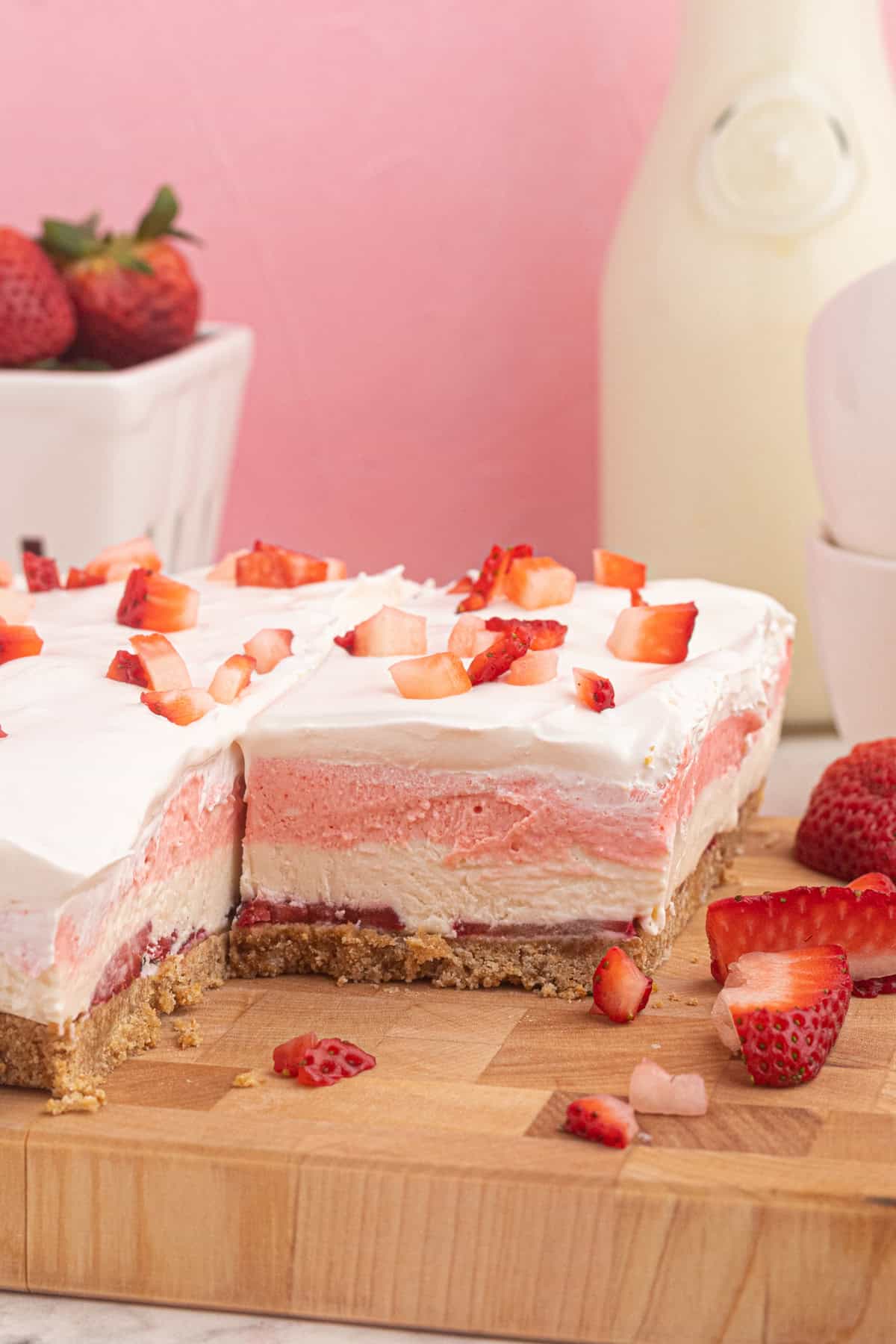 A slice of strawberry delight on a cutting board