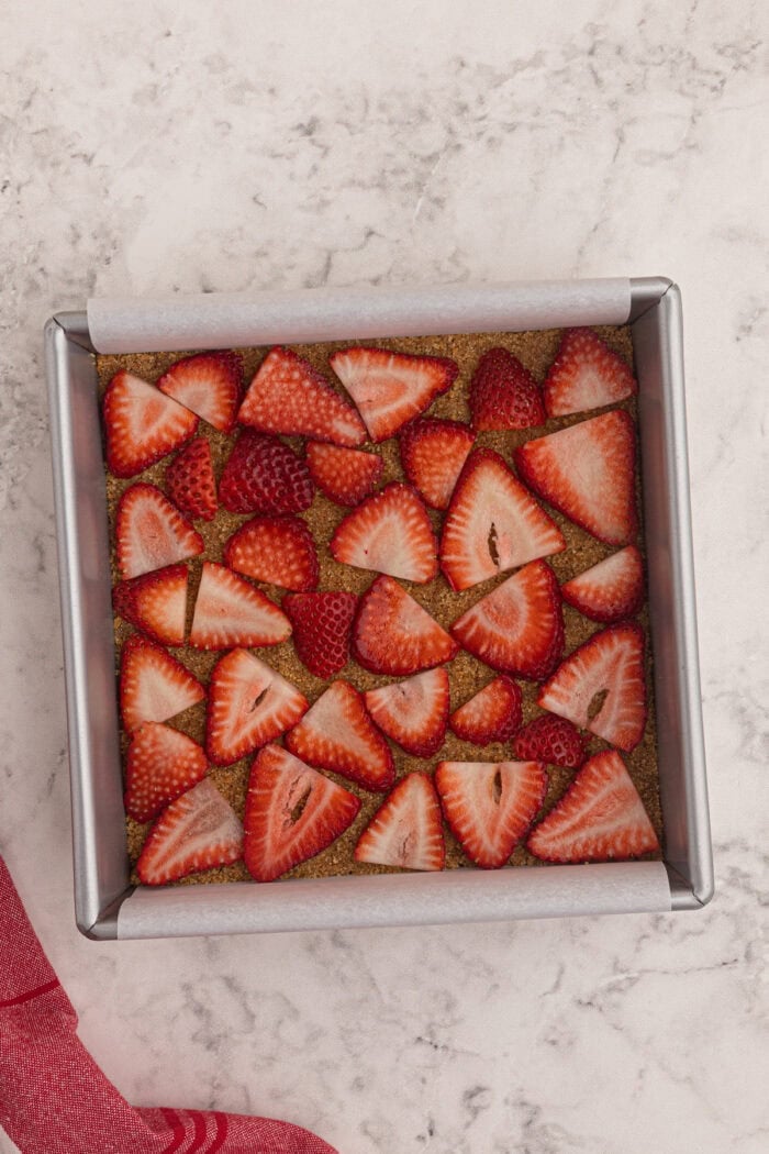 Strawberry slices in a square pan