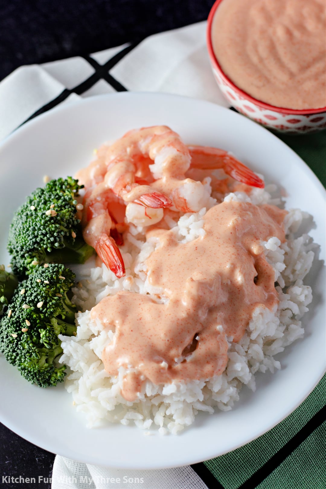 Homemade Yum Yum Sauce over rice and shrimp.