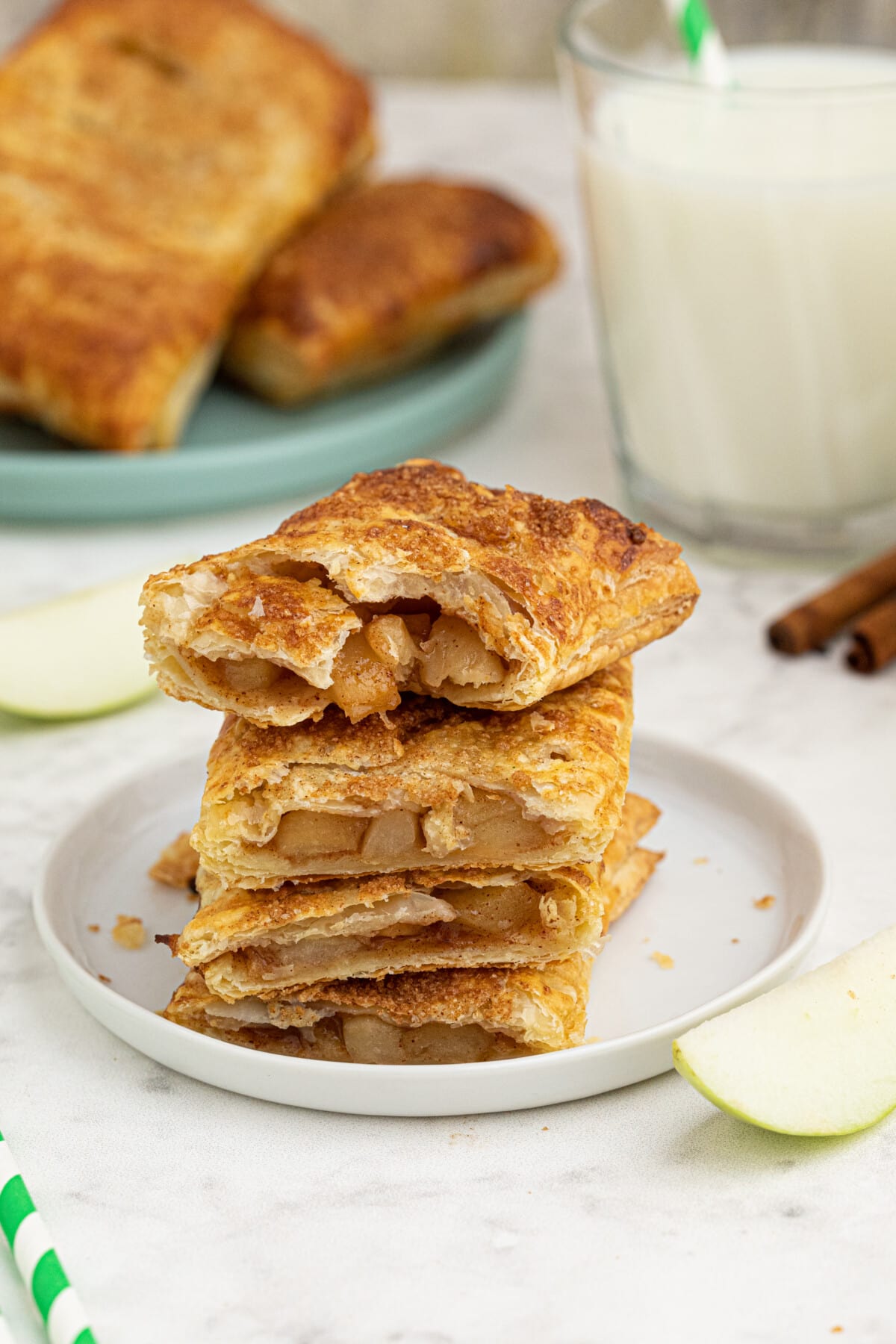 Apple Hand Pies stacked on a plate