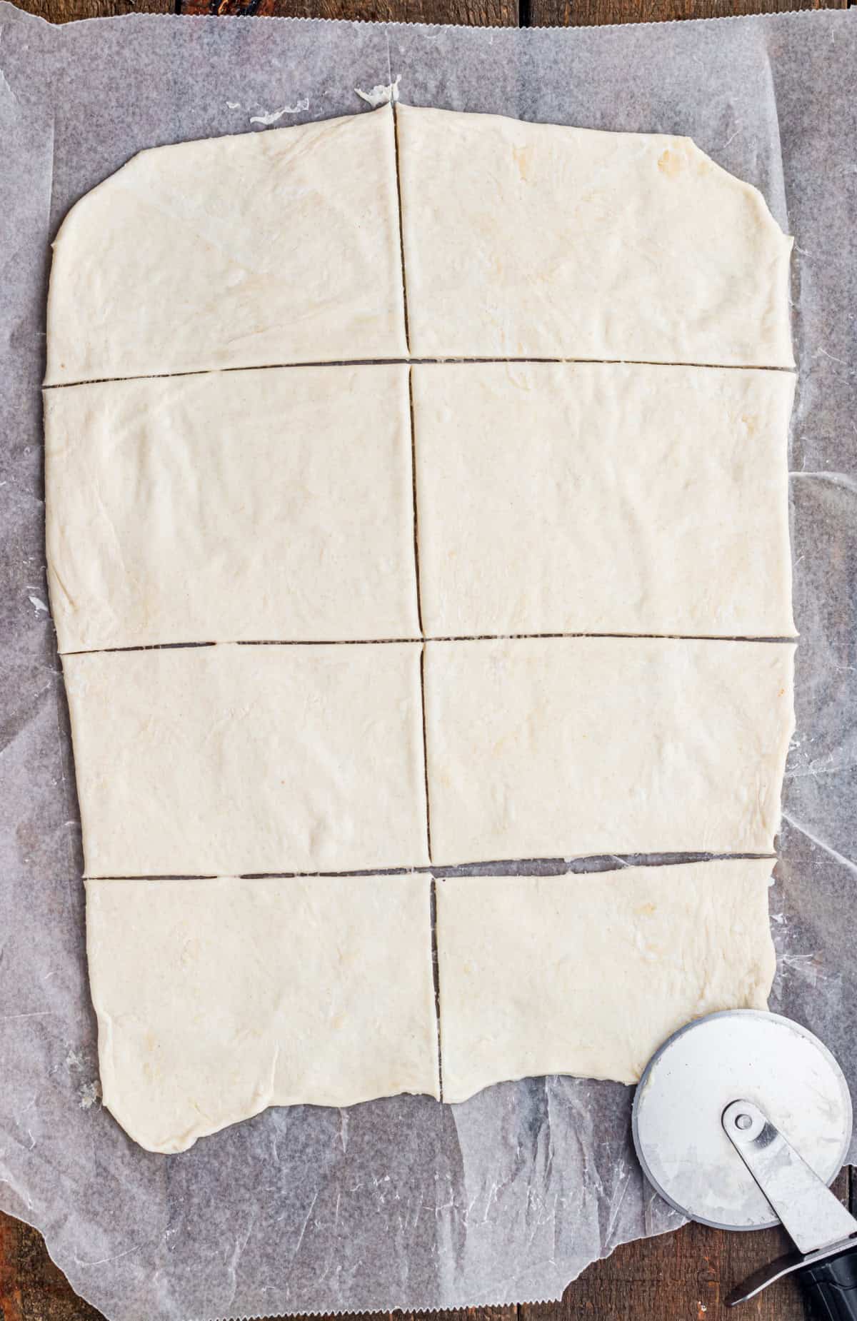 These Apple Hand Pies are filled with gooey apple pie filling wrapped in flaky puff pastry and baked until deeply golden and crisp. cutting the puff pastry sheet into squares.