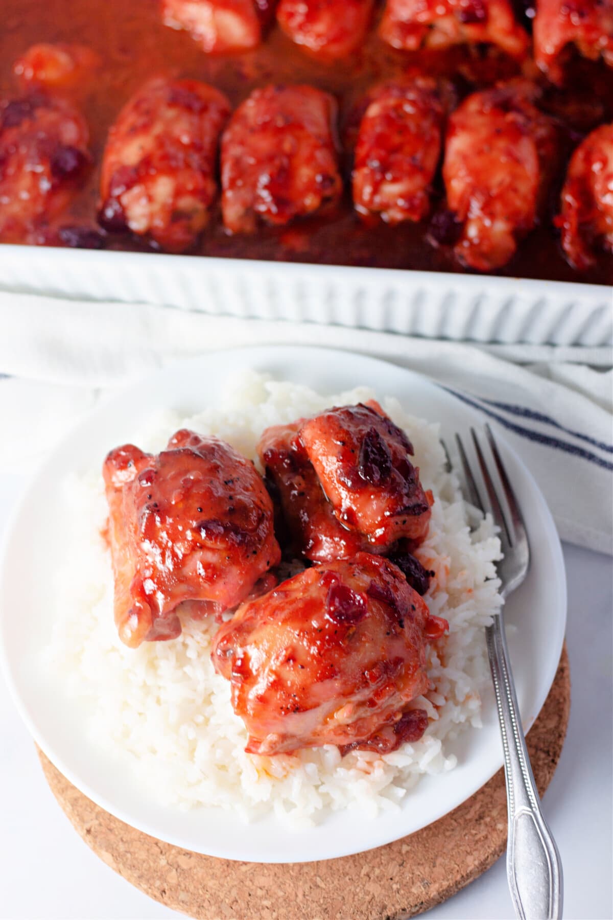 Cranberry Chicken on a plate with rice