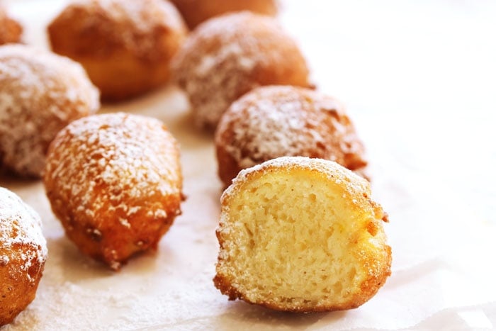 Funnel Cake Bites are a mini version of your favorite fair food. Small bites of fried dough covered in powdered sugar is a warm and delicious dessert.