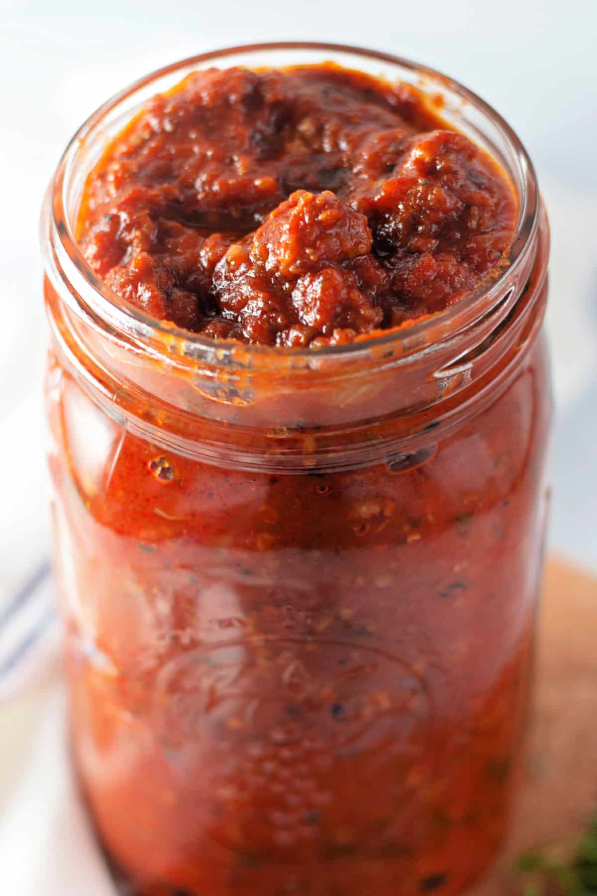 Italian sausage and ground beef are simmered with crushed and fire roasted tomatoes to make this the BEST Spaghetti Meat Sauce recipe. Homemade Spaghetti Meat Sauce in a jar