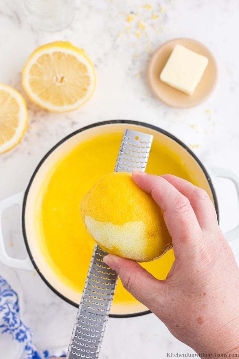 Adding the lemon zest into the pie filling.