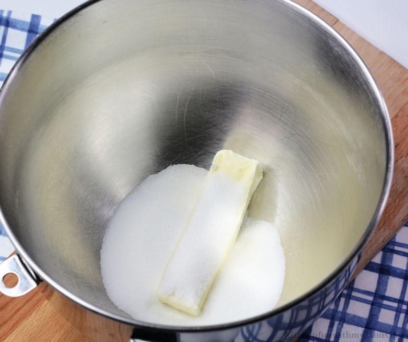 The butter and sugar in a bowl.