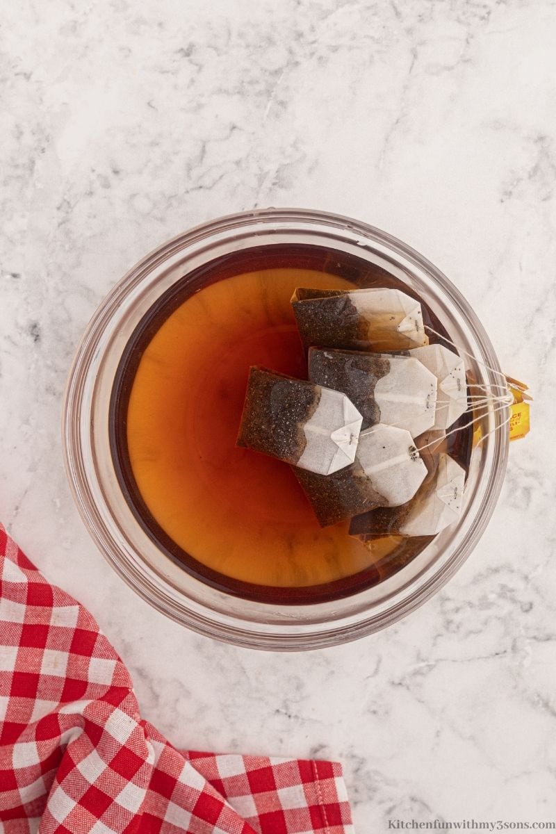 The tea bags in a bowl with water.