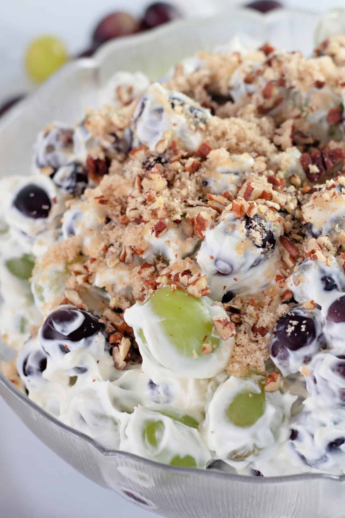 Creamy Grape Salad is a perfect sweet salad to serve as a side with dinner or even for dessert. Grape Salad in a bowl
