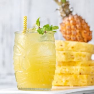 Pineapple Rum Punch is the best new summer cocktail recipe. Just three ingredients and literally seconds to make!