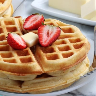 Homemade waffles topped with strawberries