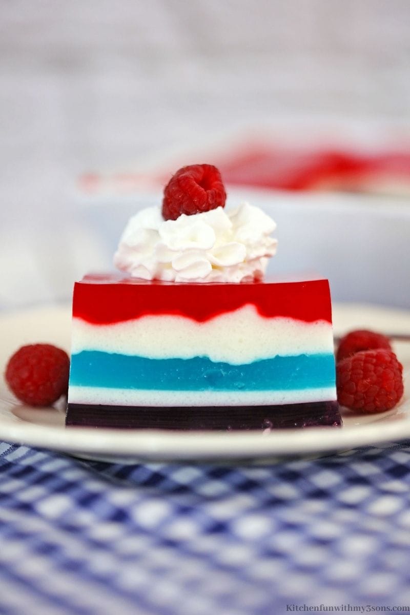 The jello topped with whipped cream.