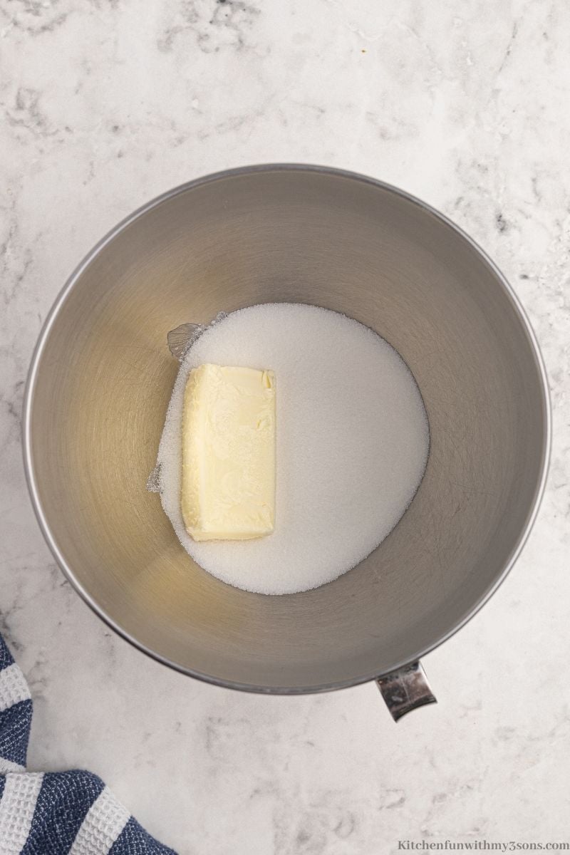 Butter and sugar in a bowl.