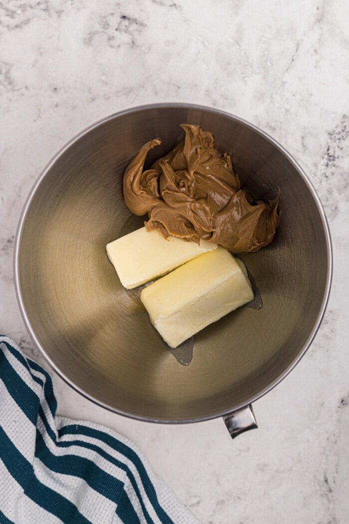 butter and peanut butter in a mixing bowl
