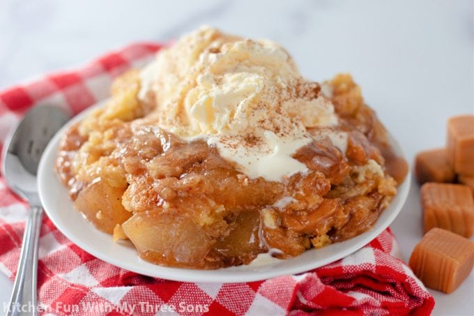 Caramel Apple Dump Cake on a red and white napkin.