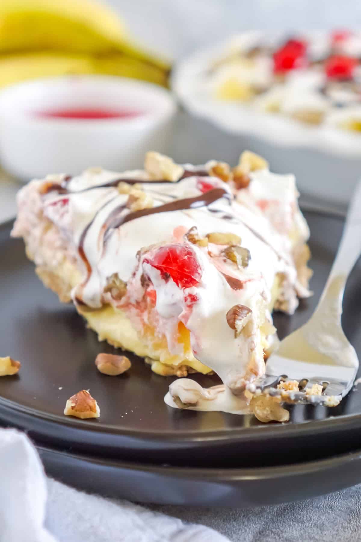 slice of banana split pie on a plate