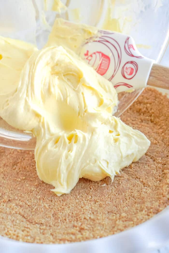 adding pudding over graham crack crust