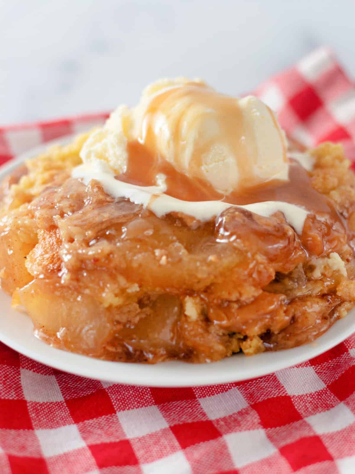 Caramel Apple Dump Cake on a plate