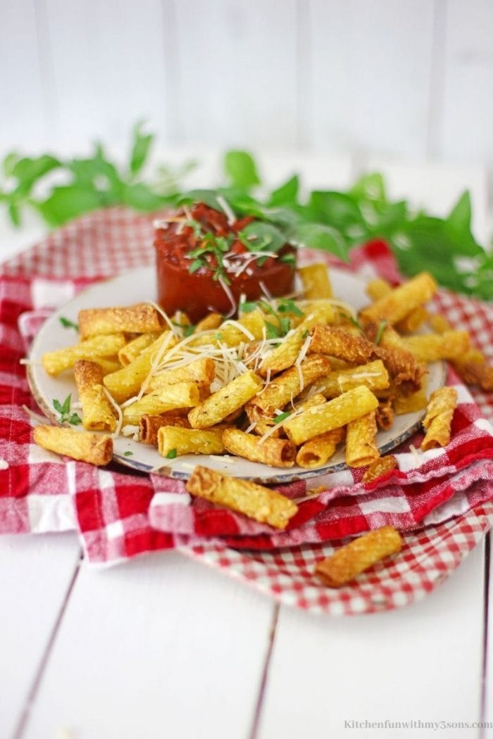 air fryer pasta chips with a red and white checkered naplin