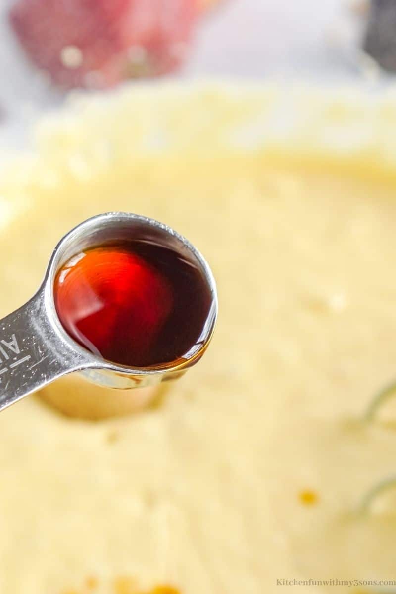 Adding the vanilla into the batter.