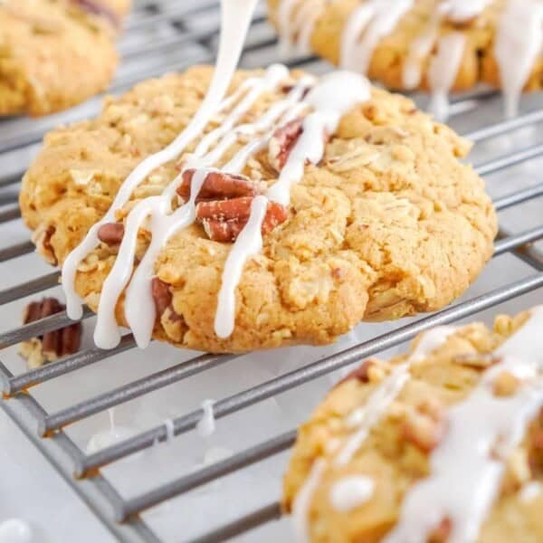 Adding the glaze on top of the cookies.
