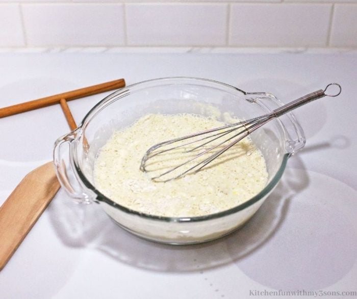 Whisking the ingredients together.