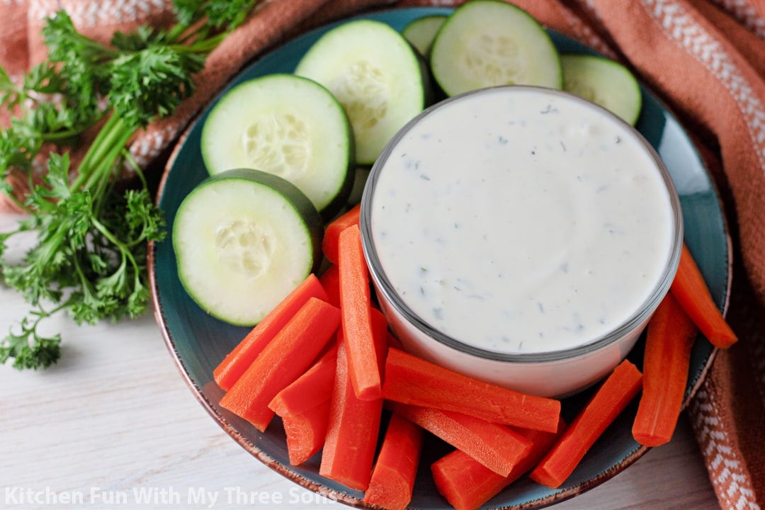 Homemade Ranch Dressing with cucumbers and carrots.