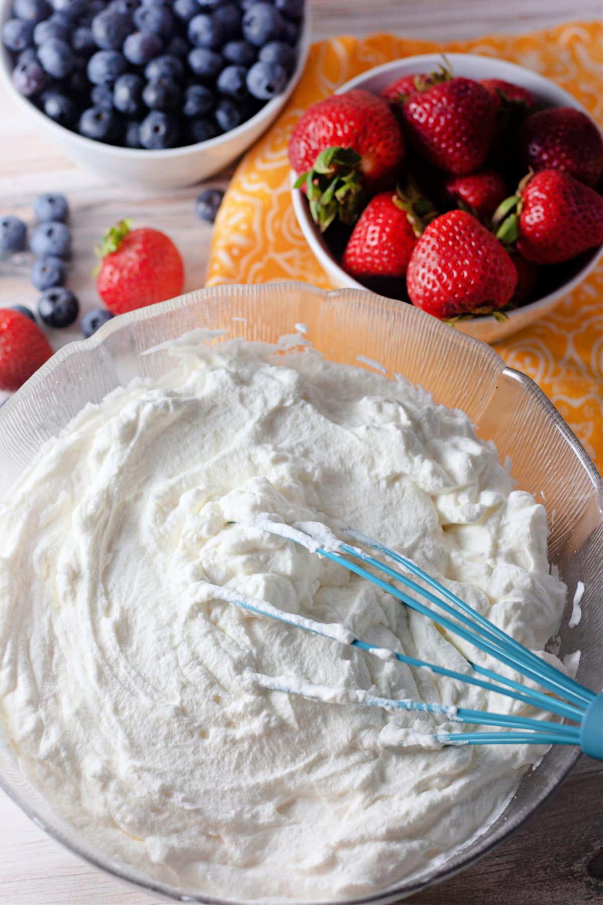 homemade whipped cream in a clear bowl