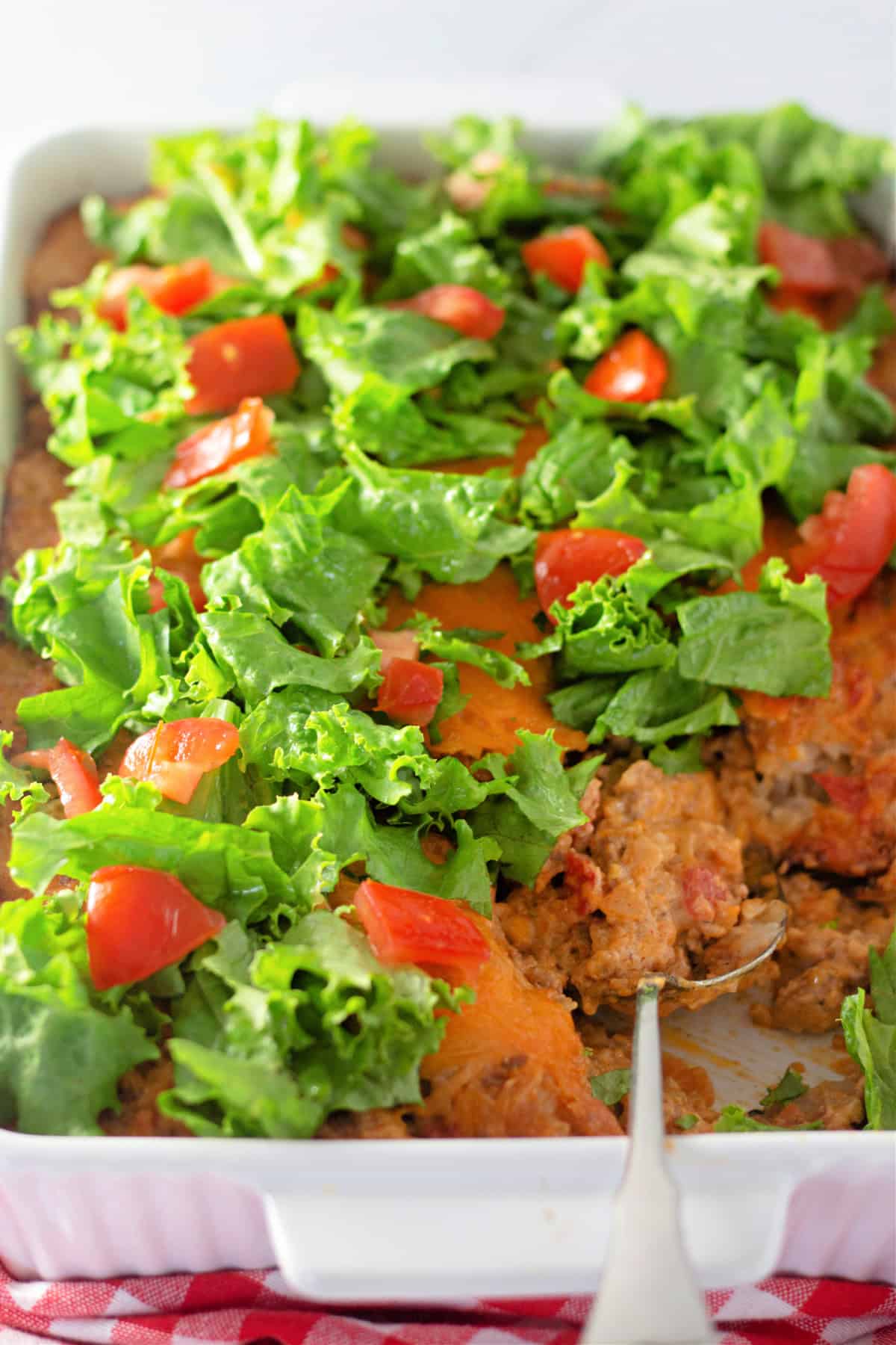 This Taco Tater Tot Casserole is the perfect quick and easy dinner for a busy weeknight. Taco Tater Tot Casserole baking dish.