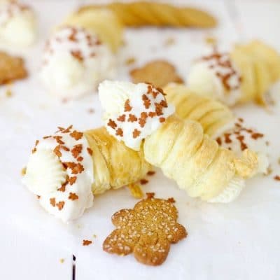 The cream horns with a gingerbread cookie.
