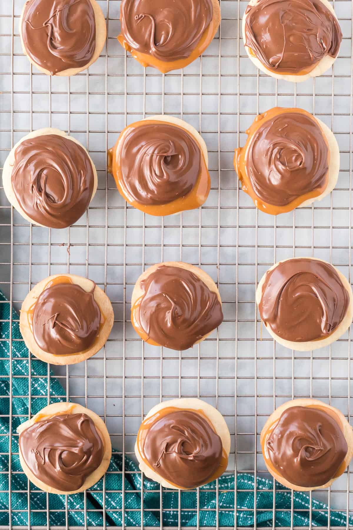 Overhead view of Twix cookies on a cooling rack