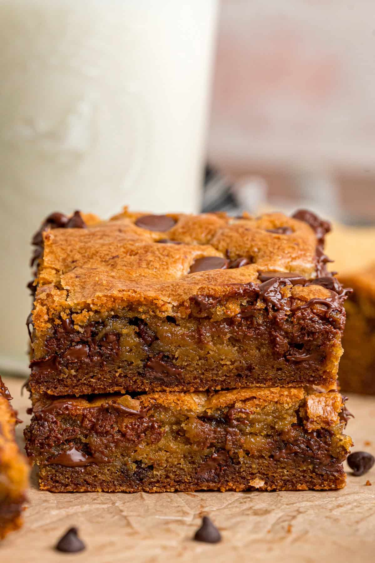 Two chocolate chip cookie bars stacked on each other