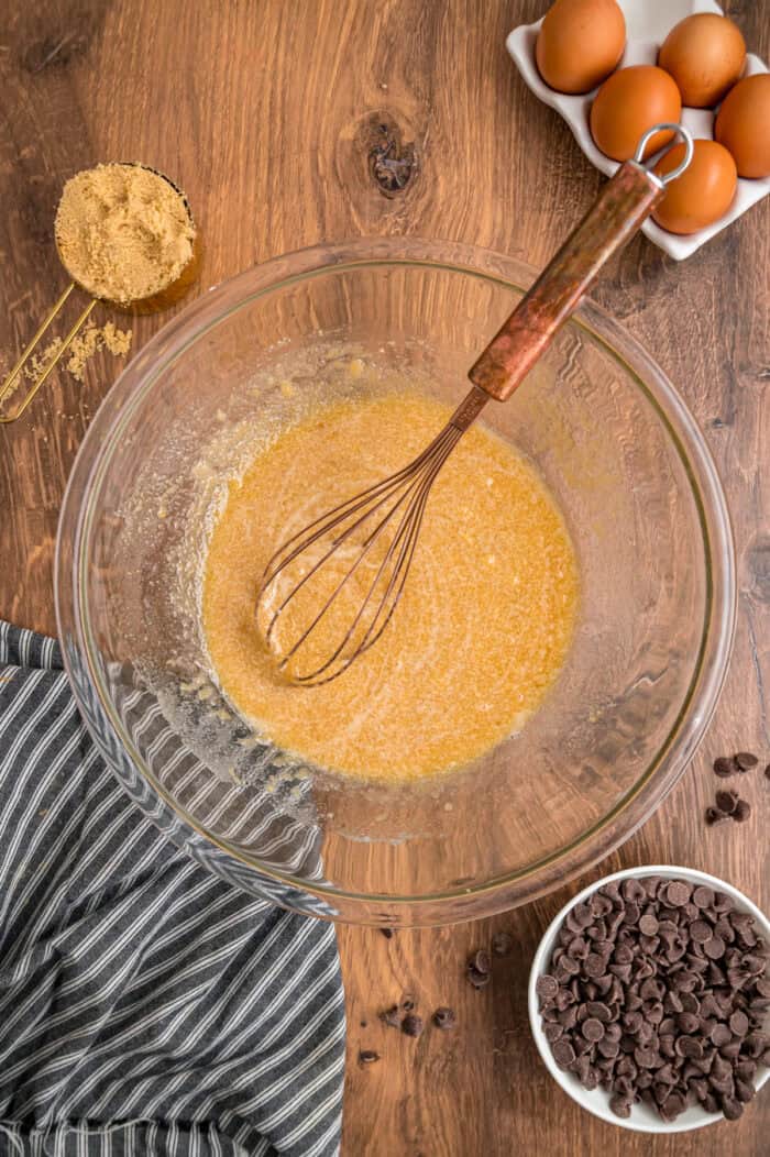 Whisking melted butter and sugar