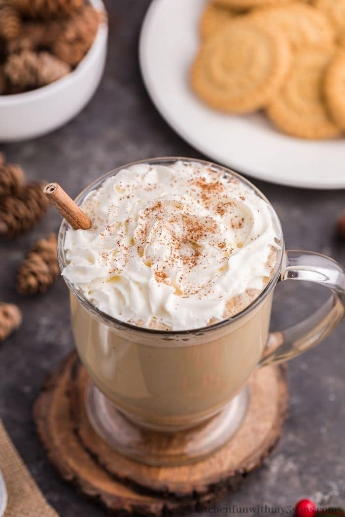 Eggnog Latte topped with cream and cinnamon.