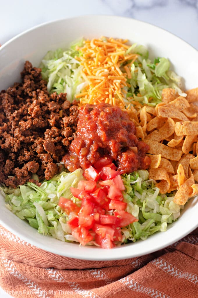 Fritos Taco Salad in a white serving bowl.