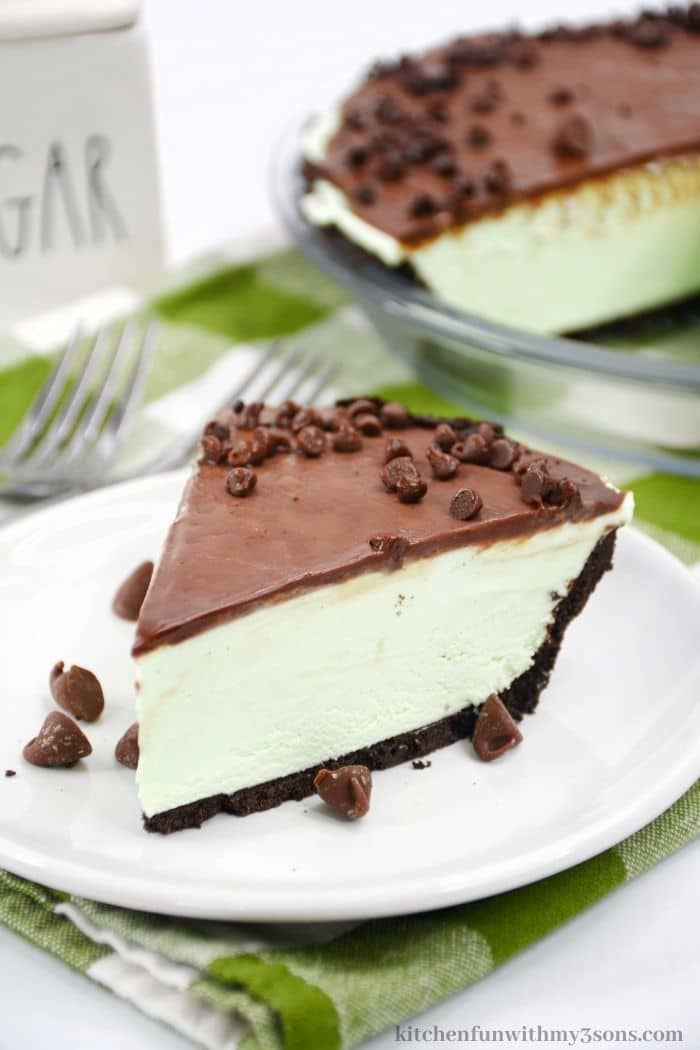 The grasshopper pie on a white and green table cloth.