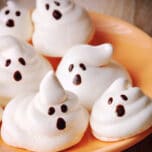 These Meringue Ghosts are so simple to make for Halloween with just 2 ingredients. Eat them alone or use them to top off a festive cupcake.