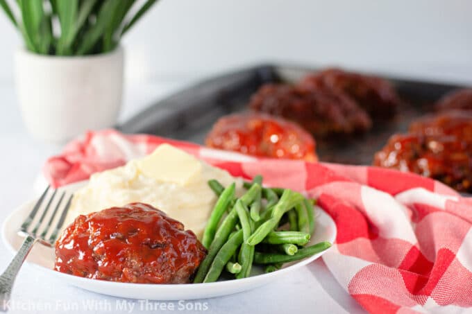 Mini Meatloaf with a red checkered napkin.