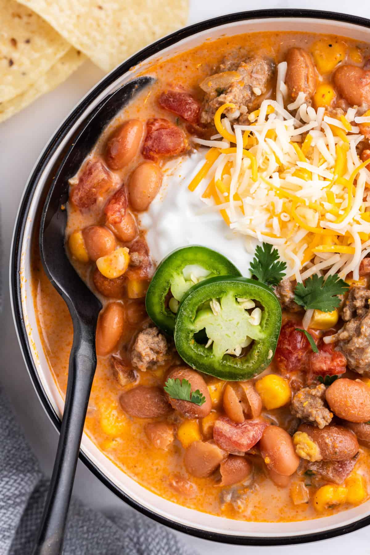This Taco Soup is the easiest soup you will ever make and packed full of taco flavors! close up of Taco Soup in a bowl