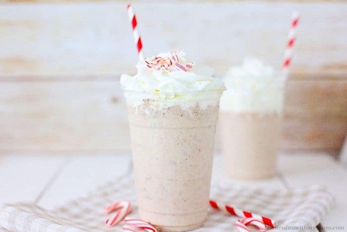 The shake with a red and white striped straw in it.