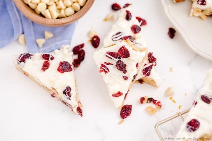 The cranberry bars on a white table.