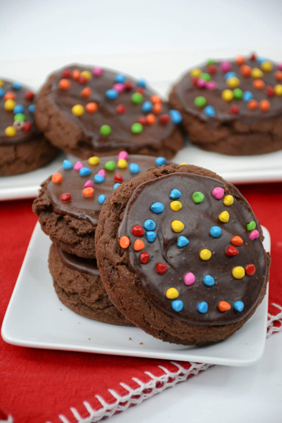 Cosmic Brownie Cookies are a fun twist on the popular cosmic brownies Little Debbie treat! The cosmic cookies on a white plate.
