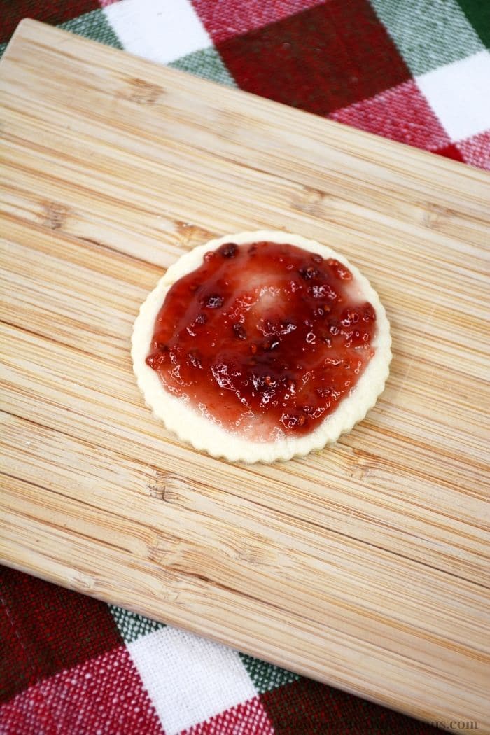 Adding a layer of jam.