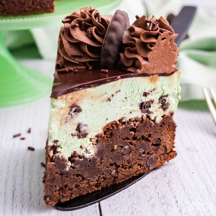 This amazing dessert combines delicious layer of brownie, a layer of Mint Chocolate Cheesecake and then all topped with whipped cream and cookies. 