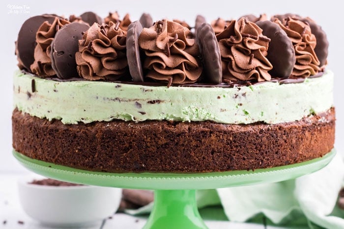 This amazing dessert combines delicious layer of brownie, a layer of Mint Chocolate Cheesecake and then all topped with whipped cream and cookies. 