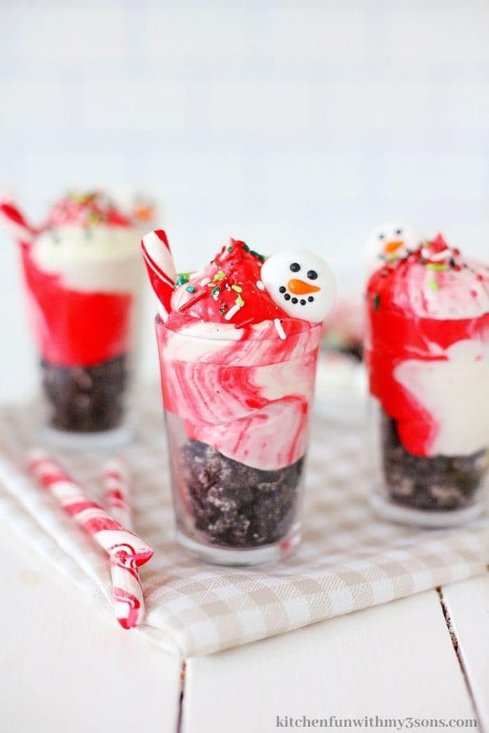 The parfaits with peppermint sticks on the side.